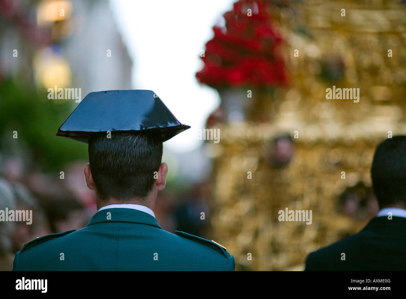 Civil Guard escorting a Holy Week float, Seville, Spain Stock Photo