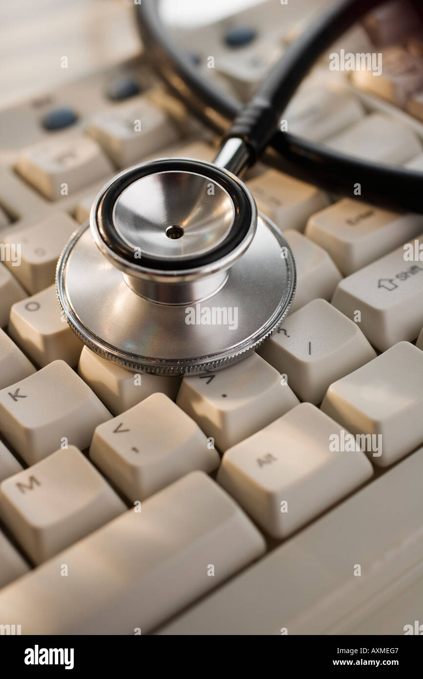 Close up of stethoscope on computer keyboard Stock Photo - Alamy