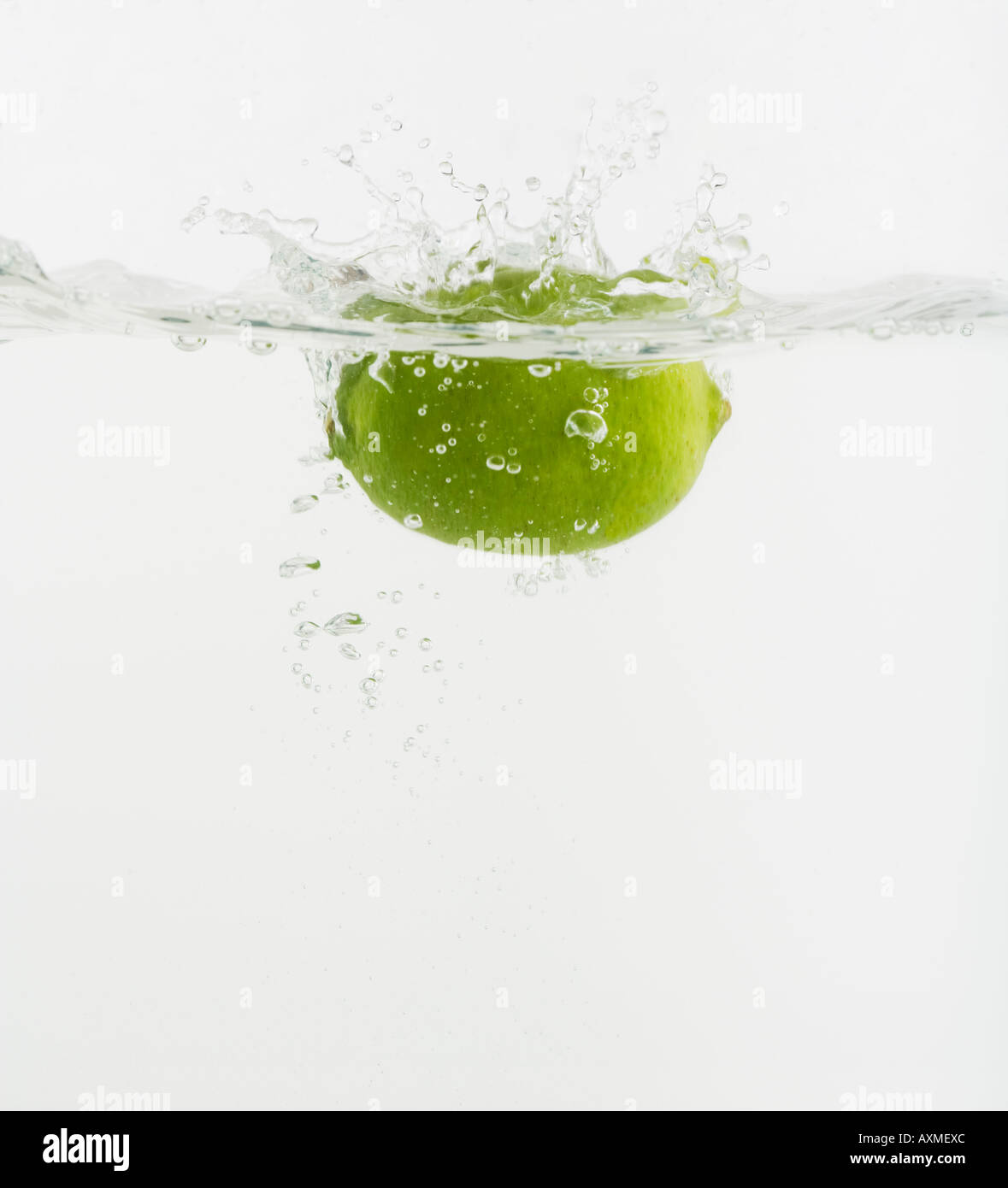 Citrus fruit dropped into water Stock Photo Alamy
