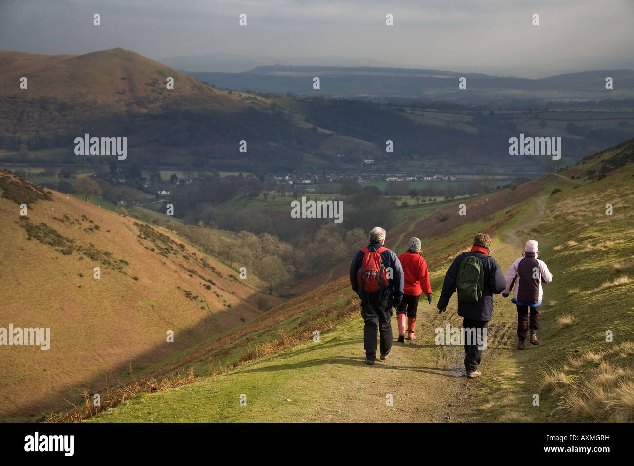 people walking in Shropshire countryside hills. Stock Photo