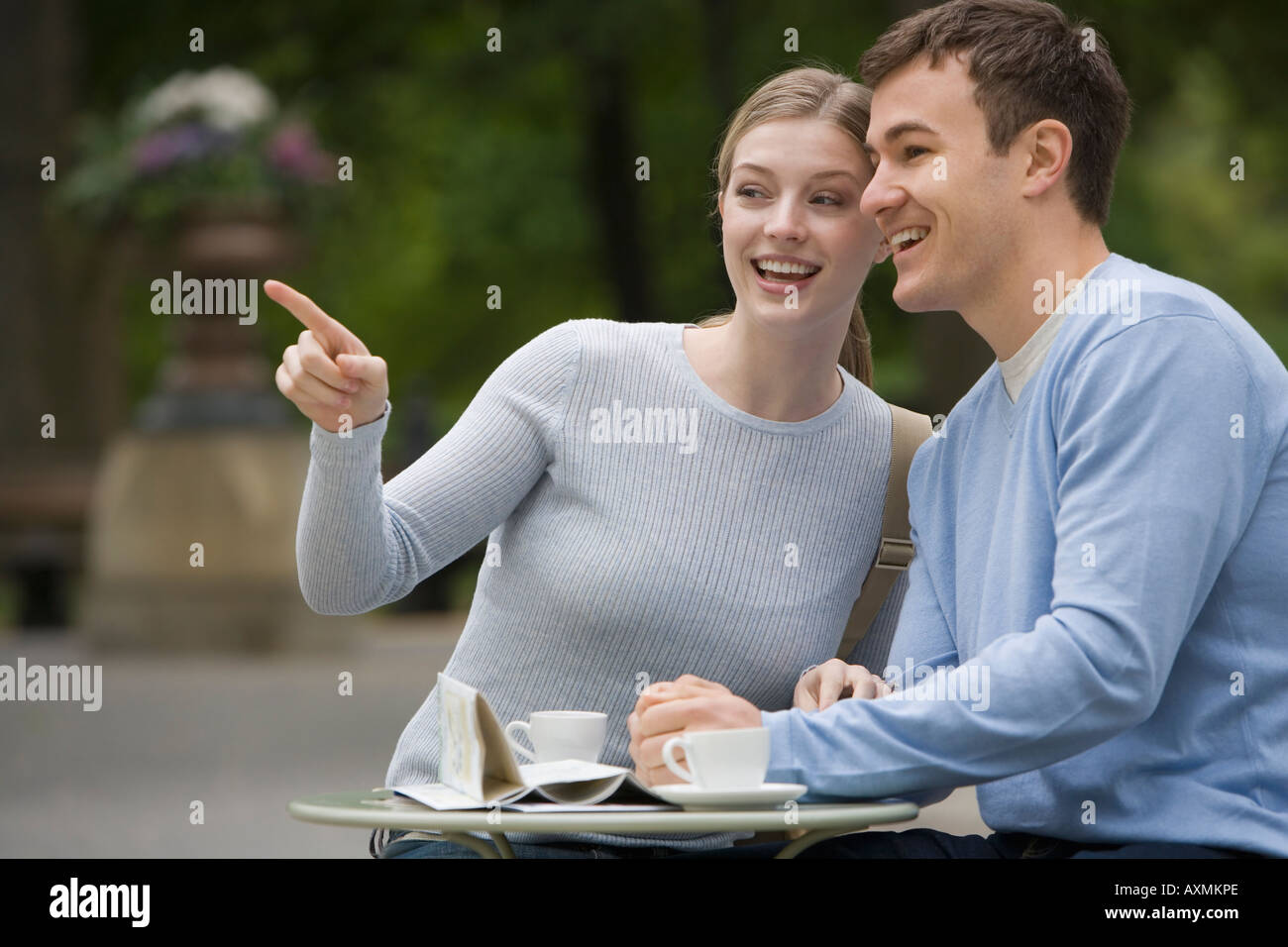 Couple having coffee at outdoor café Stock Photo