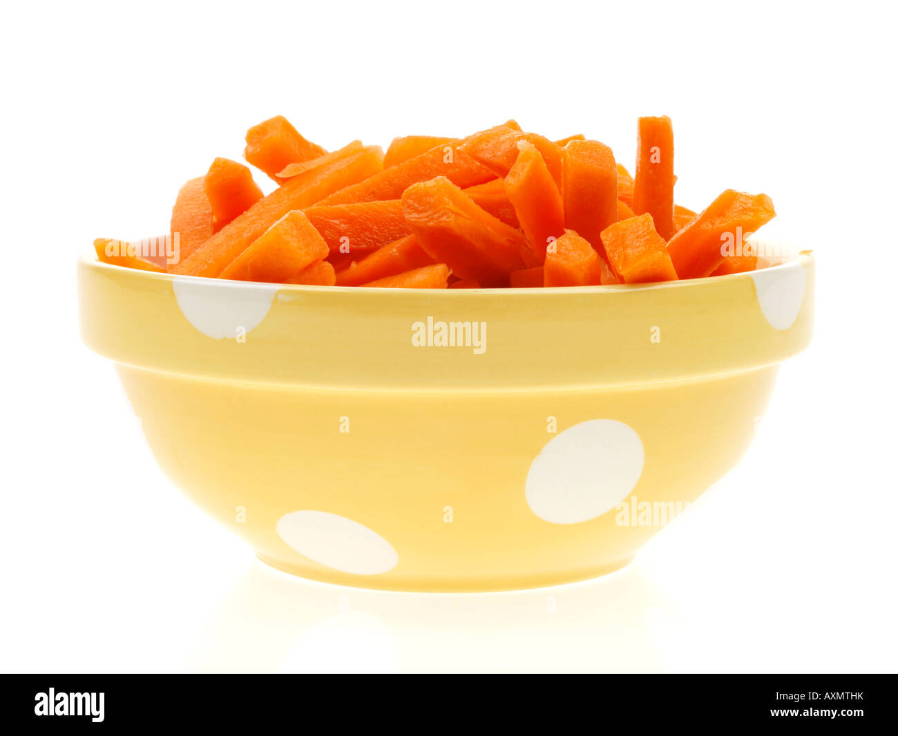 Bowl Of Fresh Healthy Prepared Carrot Batons In A Bowl Ready For Cooking Isolated Against A