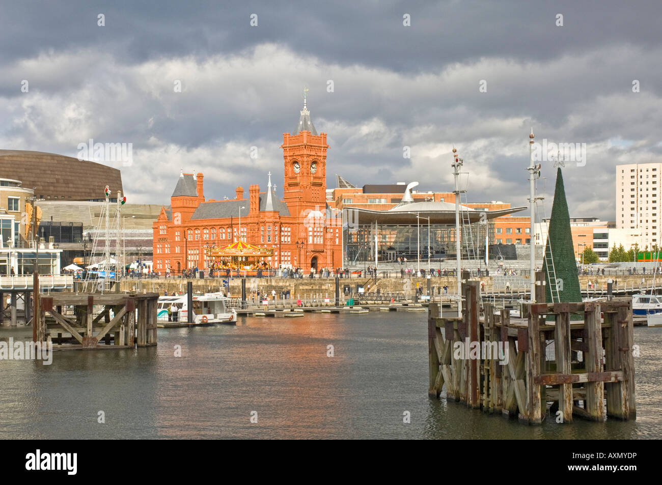 Central area of Cardiff Bay (Mermaid Quay) - a regenerated commercialised area south of Cardiff with the Pierhead Building. Stock Photo