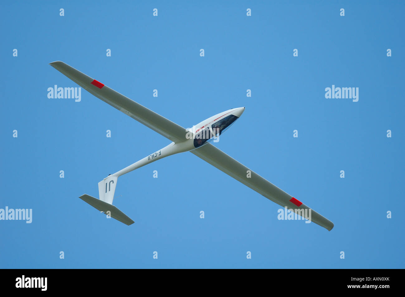 An aerobatic glider DG500 in inverted position flight during an air