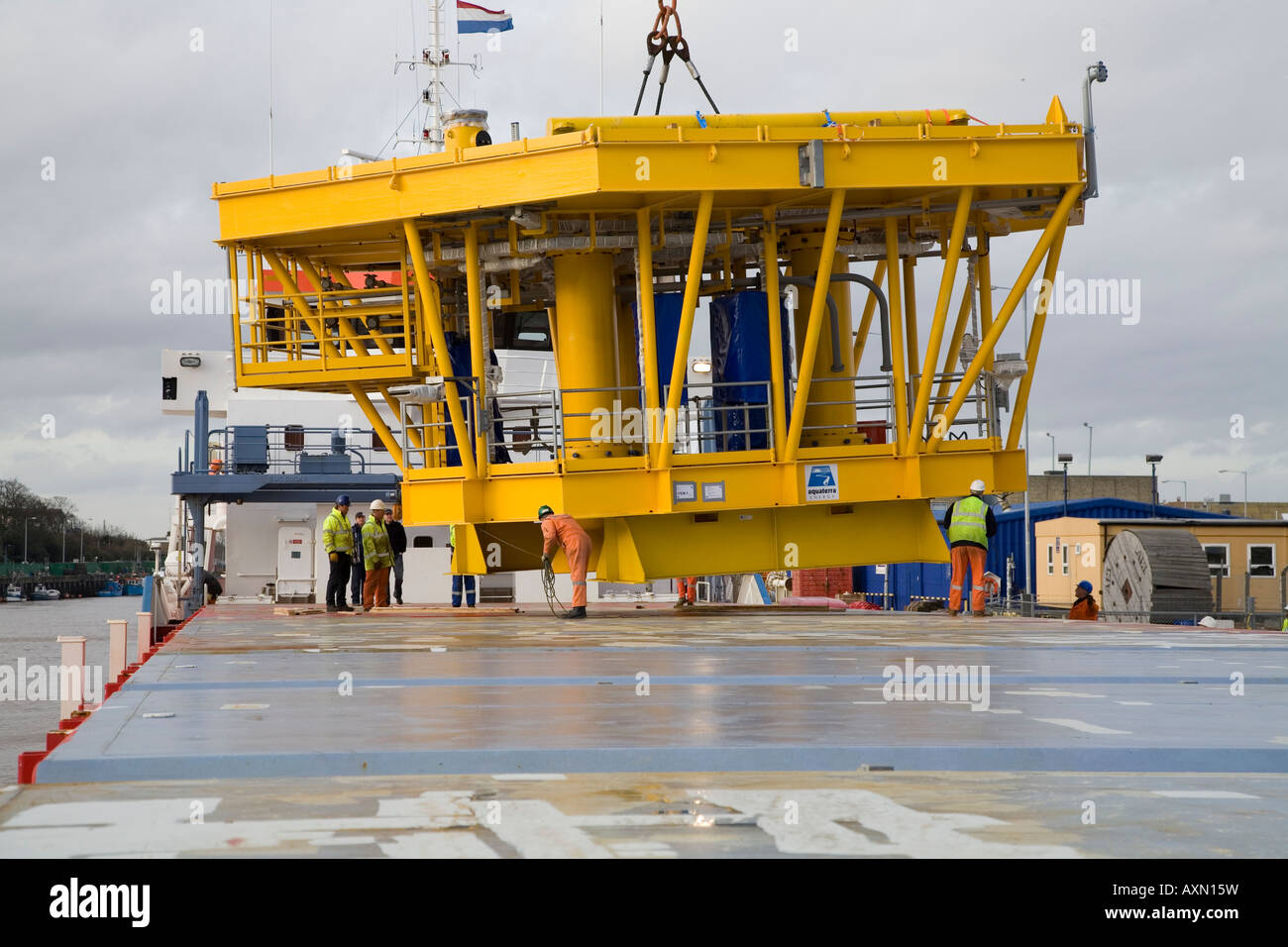 Rig platform being loaded onto container ship at Yarmouth Stock Photo ...