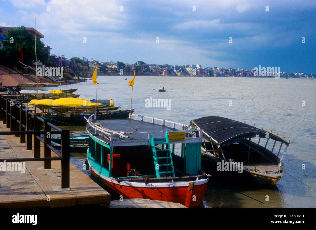 Boats on the edge of the river Ganges in Varanasi, India Stock Photo