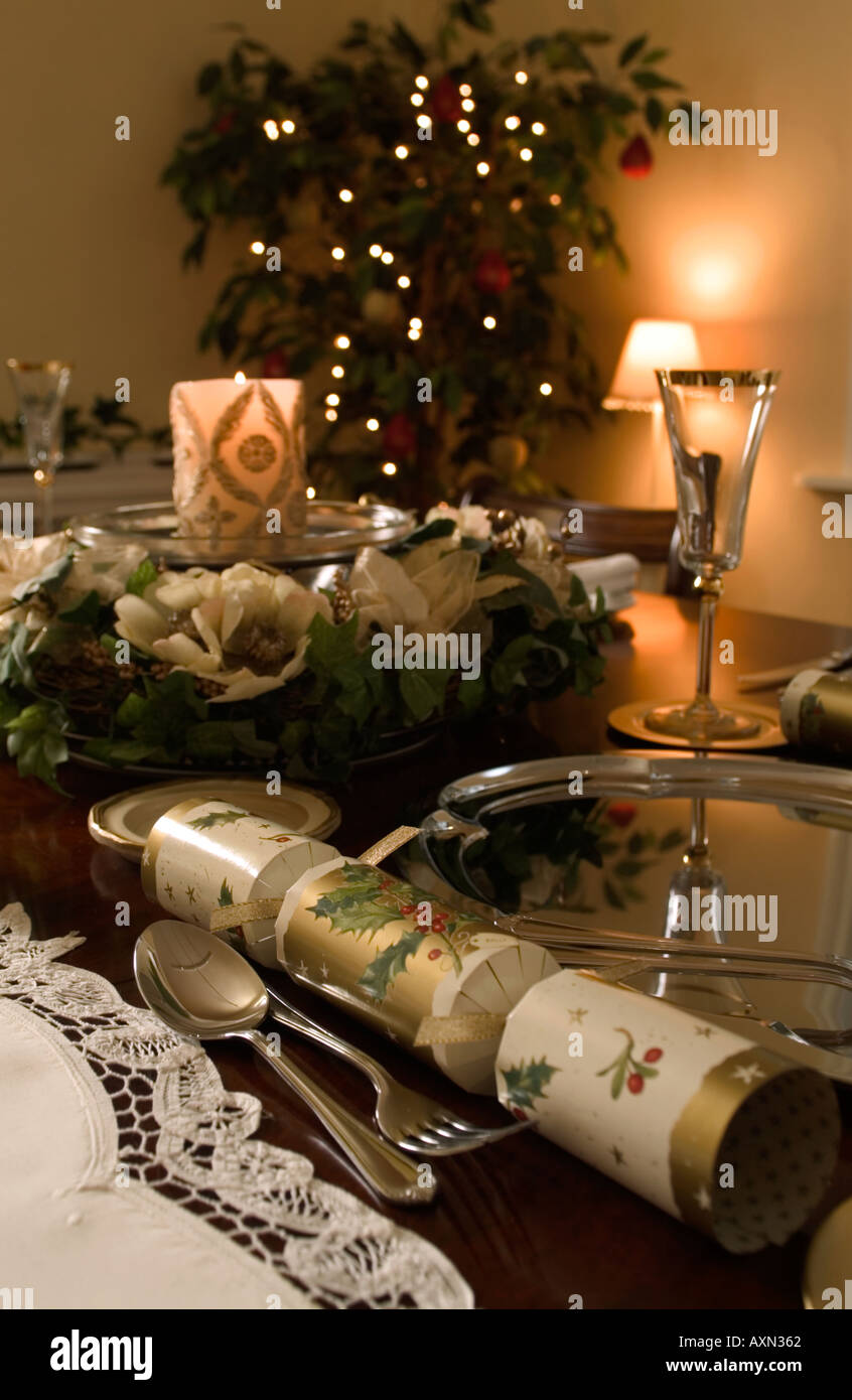 Christmas dinner table set with candle Stock Photo Alamy