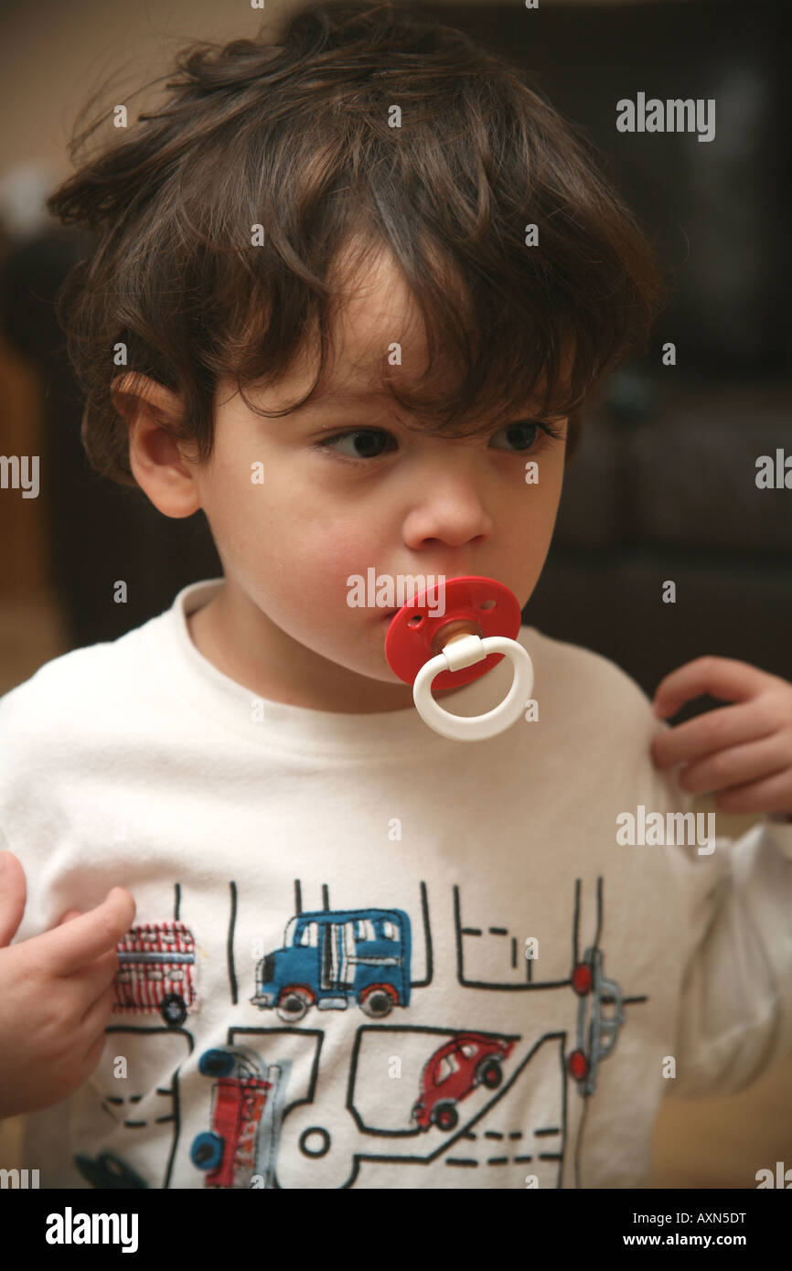 Little boy with dummy Stock Photo Alamy