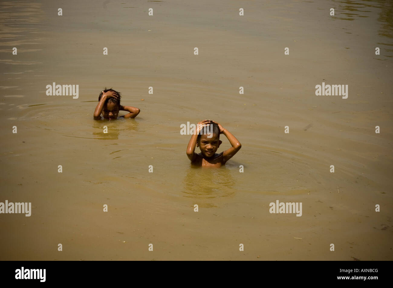 Washing in the river, Bangladesh Stock Photo