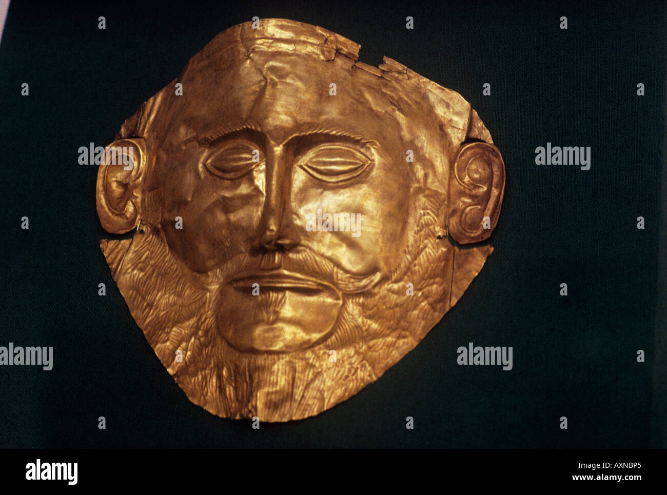 The gold mask of Agememnon in the Museum at Athens. It was found by Heinrich Schliemann in 1876, Stock Photo