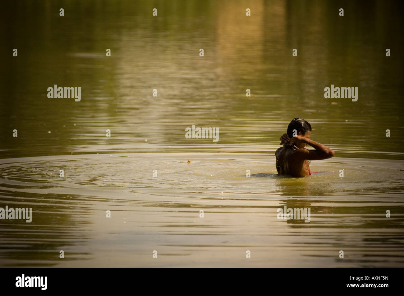Washing in the river, Bangladesh Stock Photo