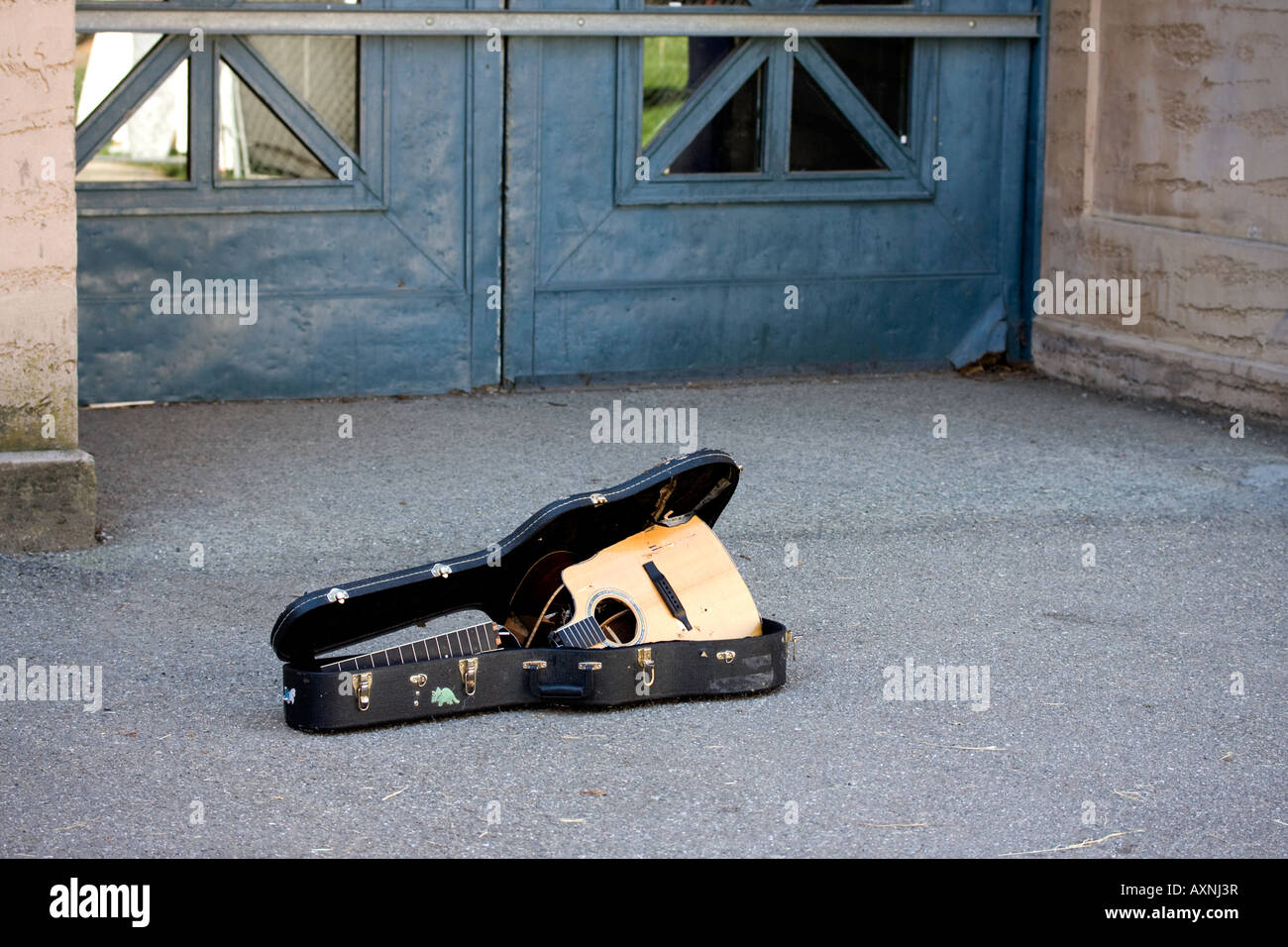 Broken Guitar in case Stock Photo - Alamy