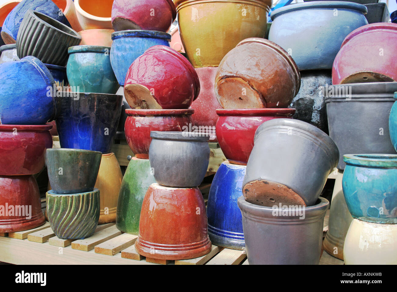 Multicoloured glazed garden pots, garden centre near Kilmarnock, Scotland Stock Photo