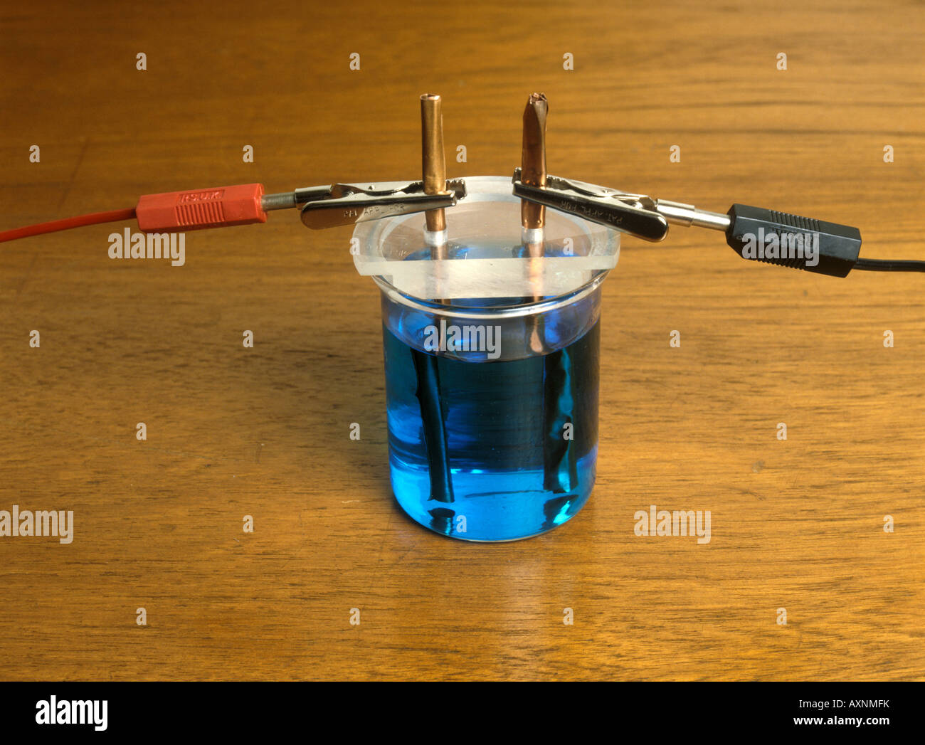 Electrolysis of copper sulphate solution using copper electrodes Stock Photo