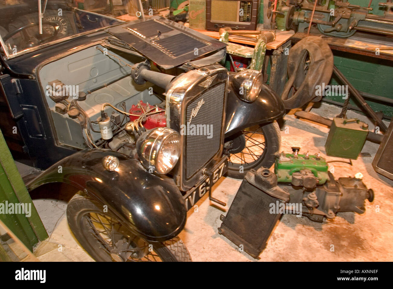reconstruction of early car repair workshop Stock Photo
