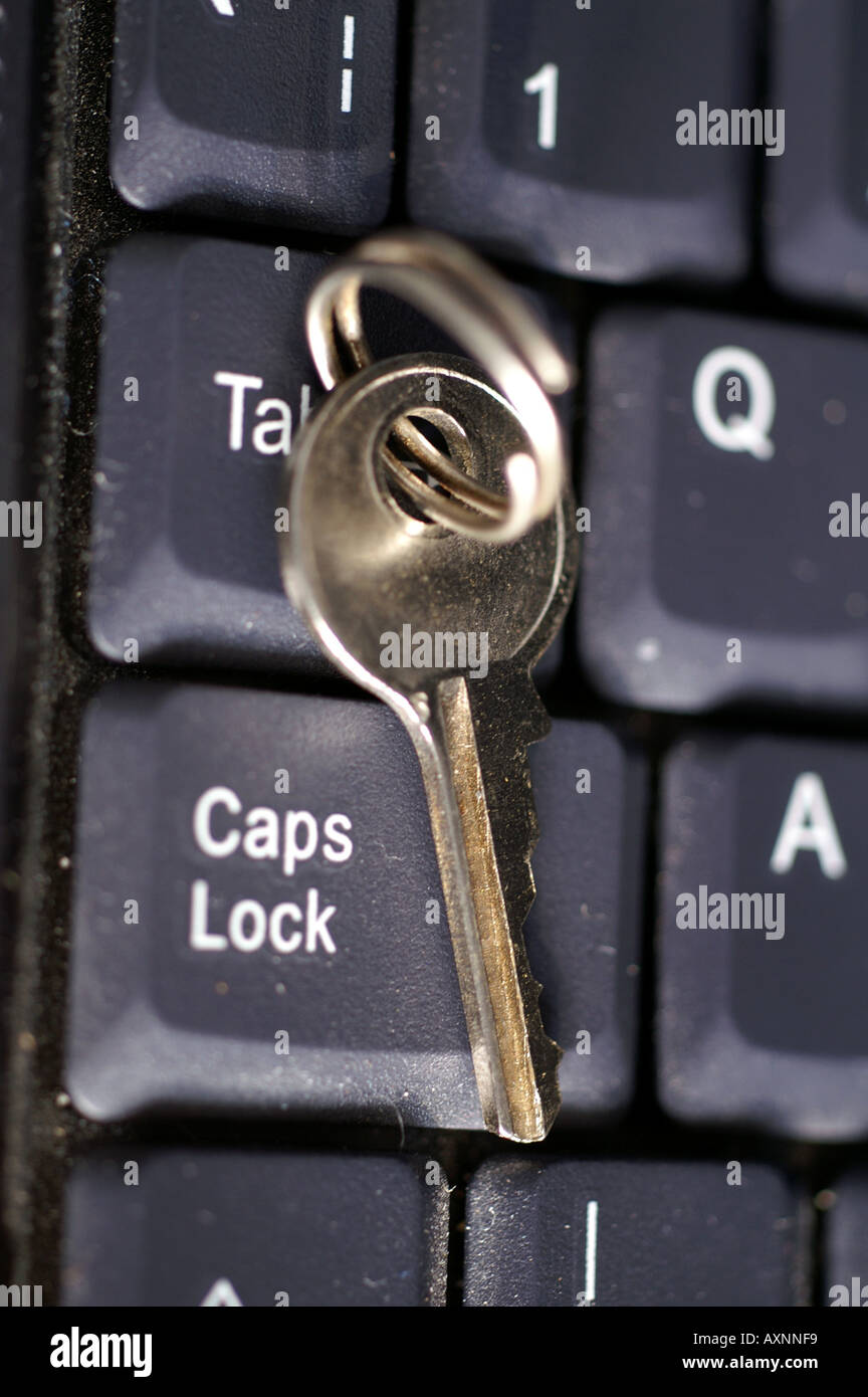 Key by Caps lock button on laptop keyboard security digital risk