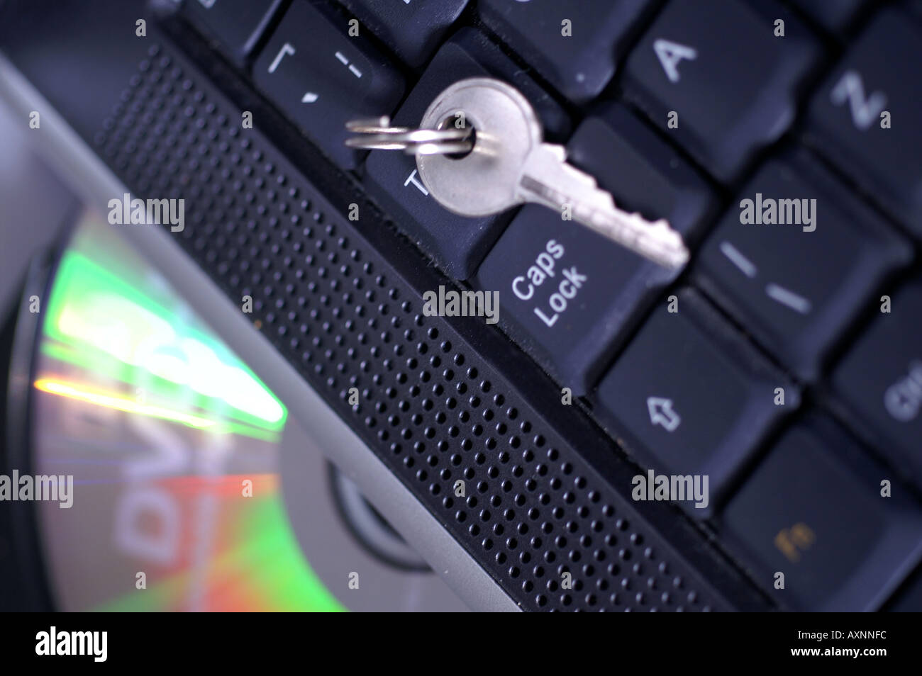 Key by Caps lock button on laptop keyboard security digital risk ...
