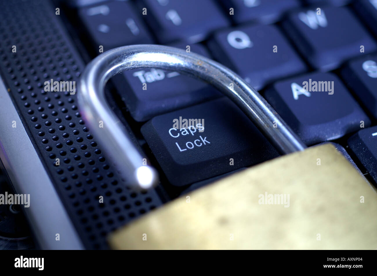 Open padlock around Caps lock key on laptop keyboard Stock Photo Alamy