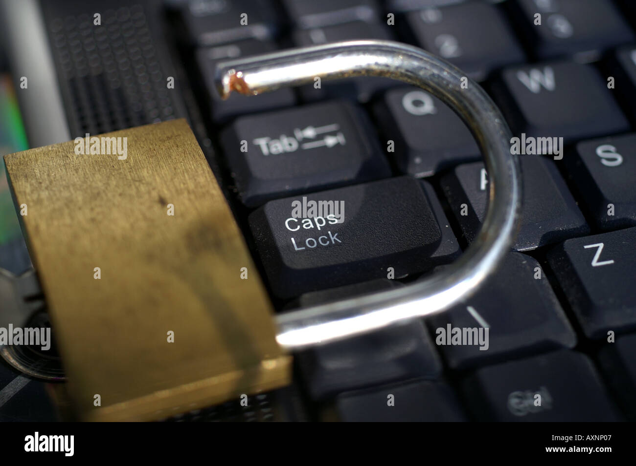 Open padlock around Caps lock key on laptop keyboard Stock Photo Alamy