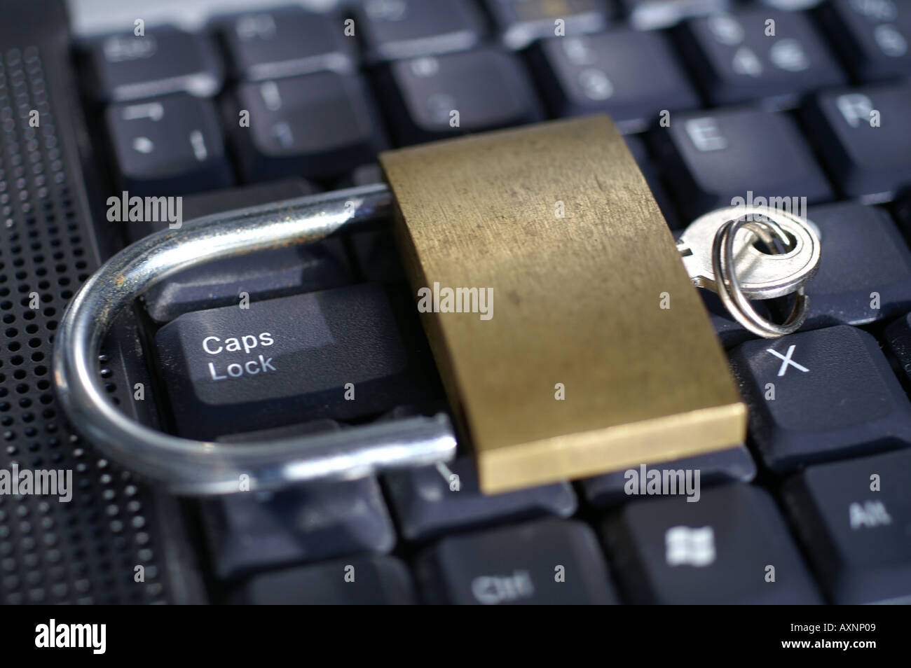 Open padlock around Caps lock key on laptop keyboard Stock Photo Alamy