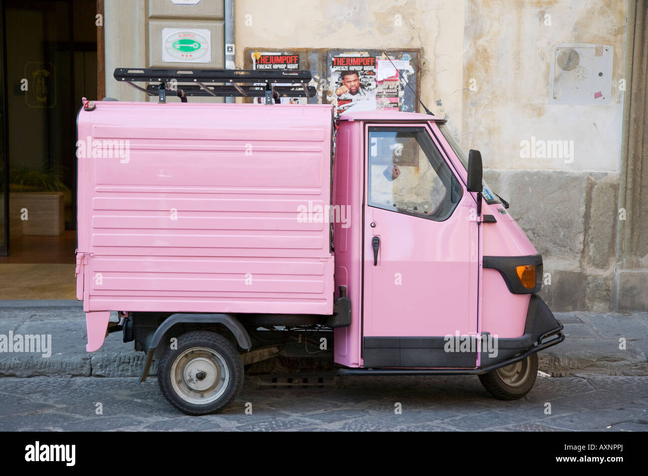 Pink API van in Florence Italy Stock Photo - Alamy