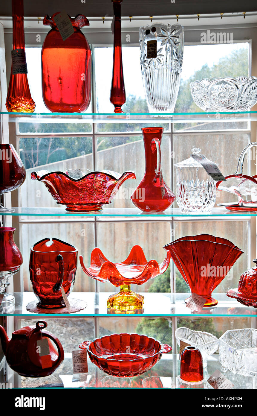 Display of antique glassware on sale at an antique shop Stock Photo Alamy