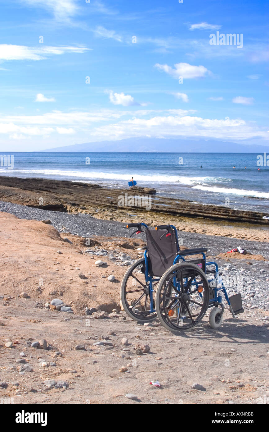 wheelchair on the beach Stock Photo Alamy