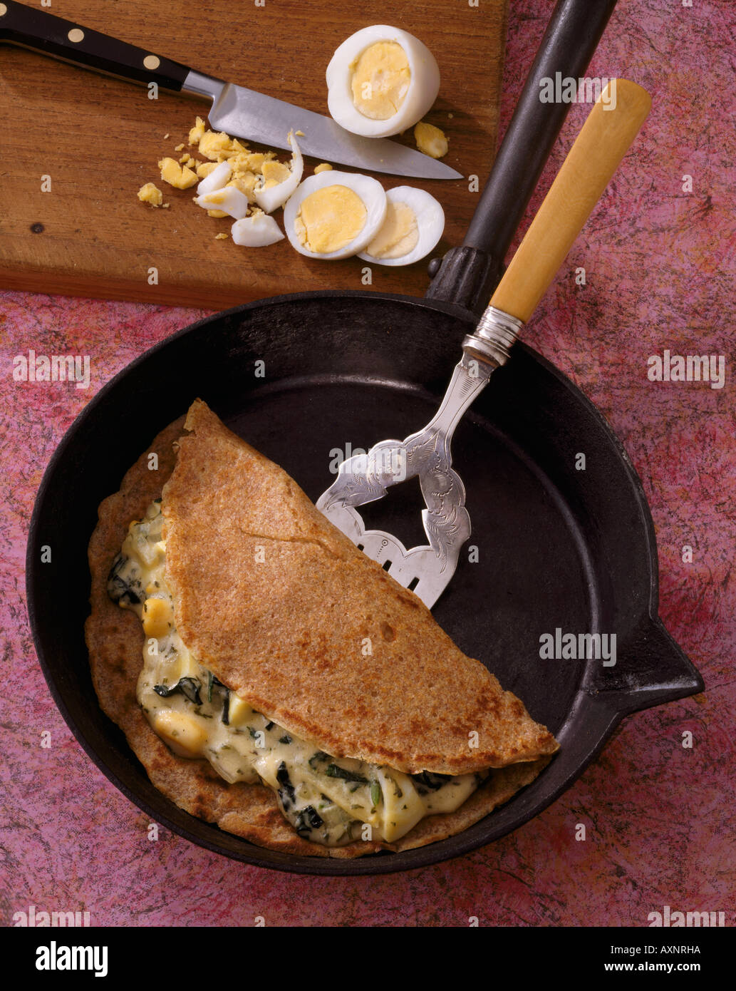 Hard boiled egg and spinach pancake Stock Photo Alamy