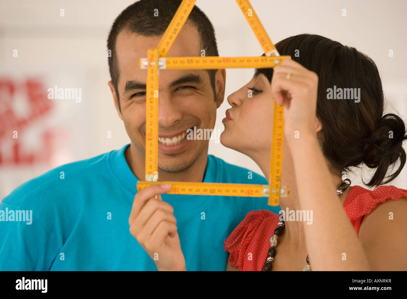 Couple Holding Folding Ruler Shaped Like House Stock Photo Alamy couple-holding-folding-ruler-shaped-like-house-stock-photo-alamy