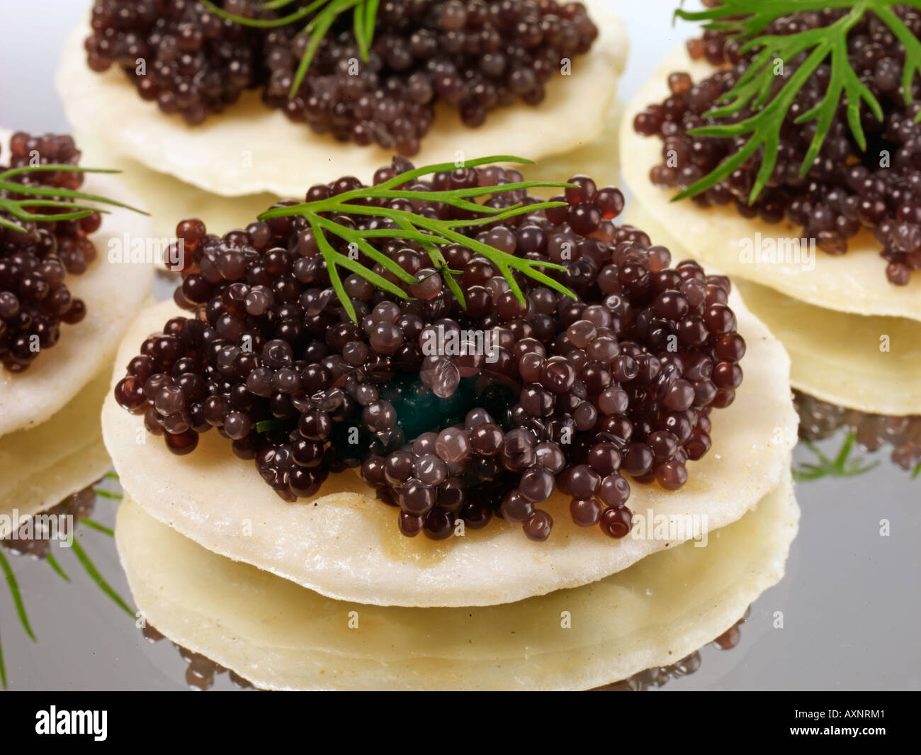 Russian Caviar On Rice Cracker Stock Photo Alamy