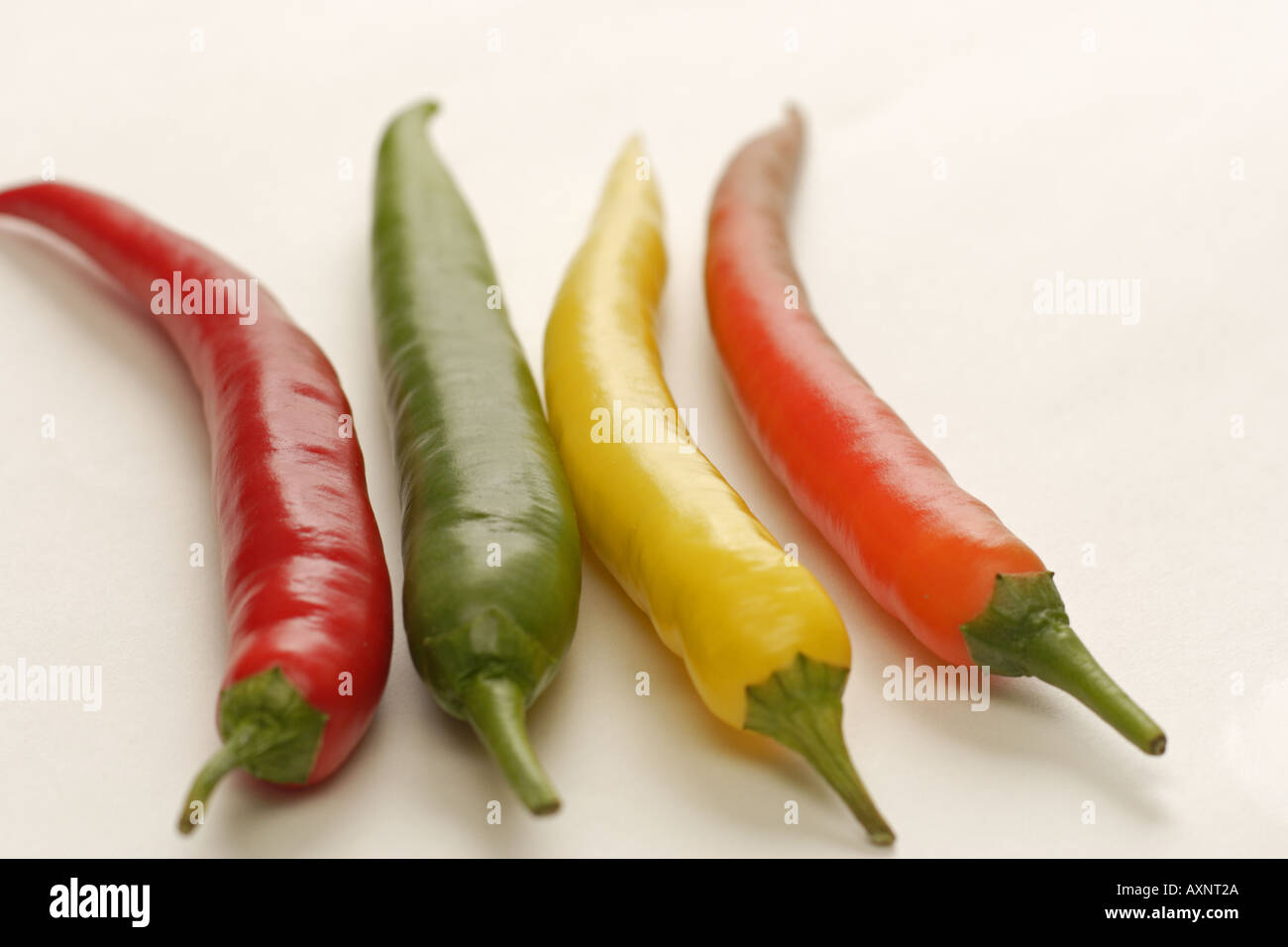Red chili peppers green chilli Cut Out Stock Images & Pictures - Alamy