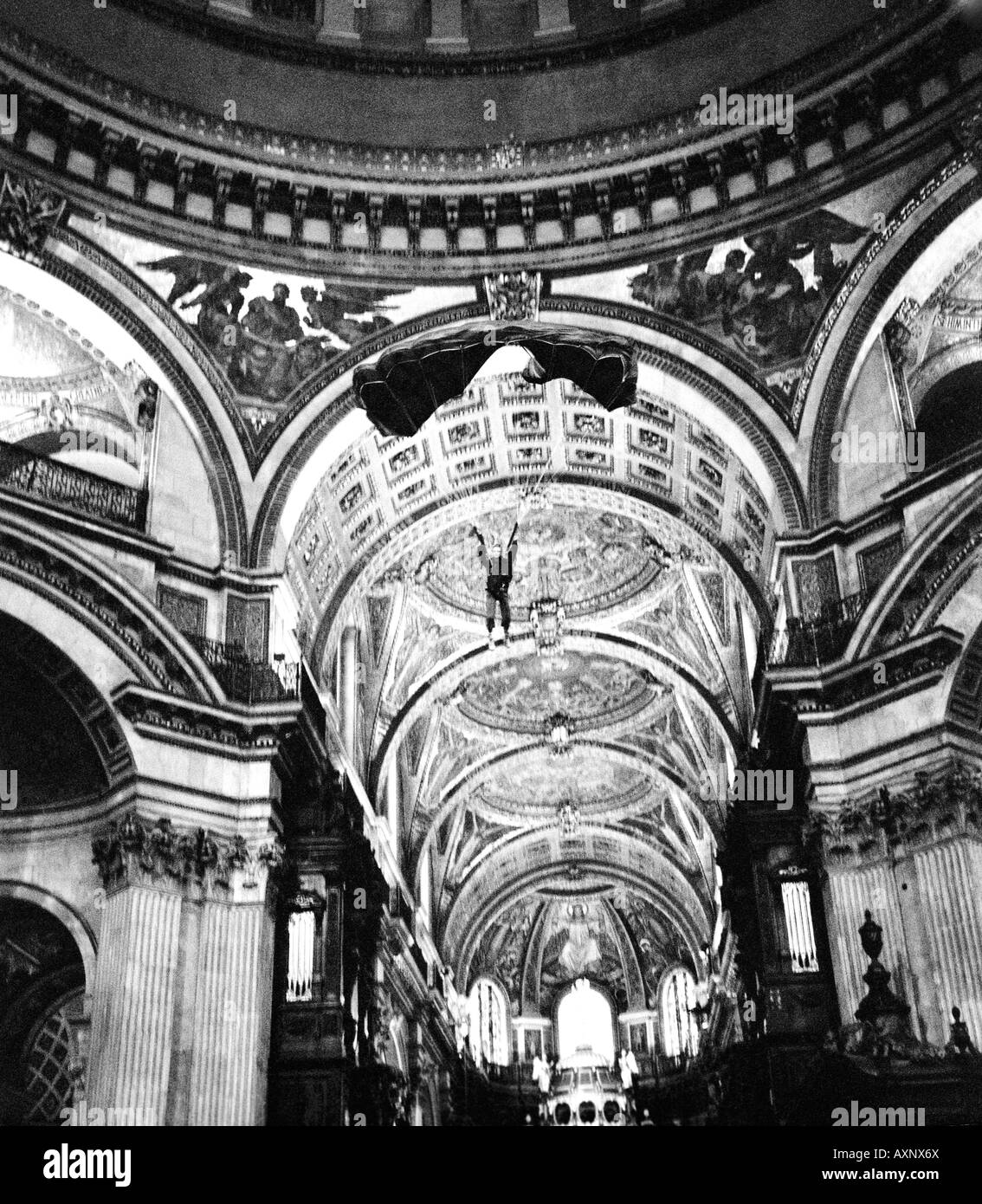 Russell Powell BASE 230 BASE Jumping from the Whispering Gallery inside St Pauls Cathedral London. Picture copyright Doug Blane. Stock Photo