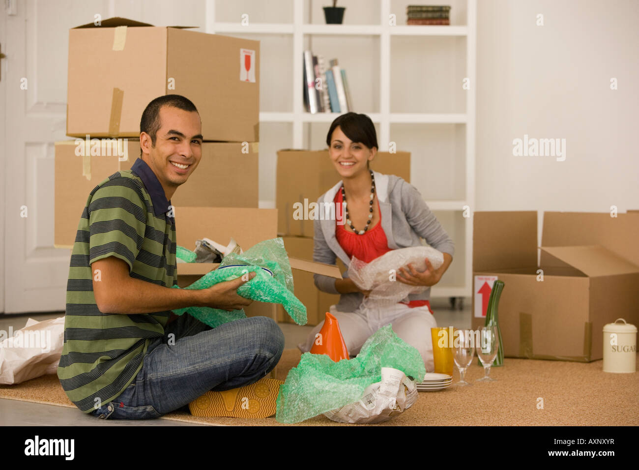 Woman packing boxes door hi-res stock photography and images - Alamy