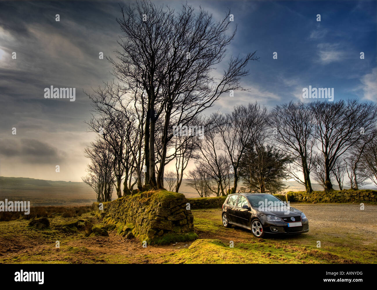 2007 Mark 5 Volkswagen VW Golf GTi Turbo black car lit by flash speedlights at sunset five door alloys alloy wheels drama car Stock Photo