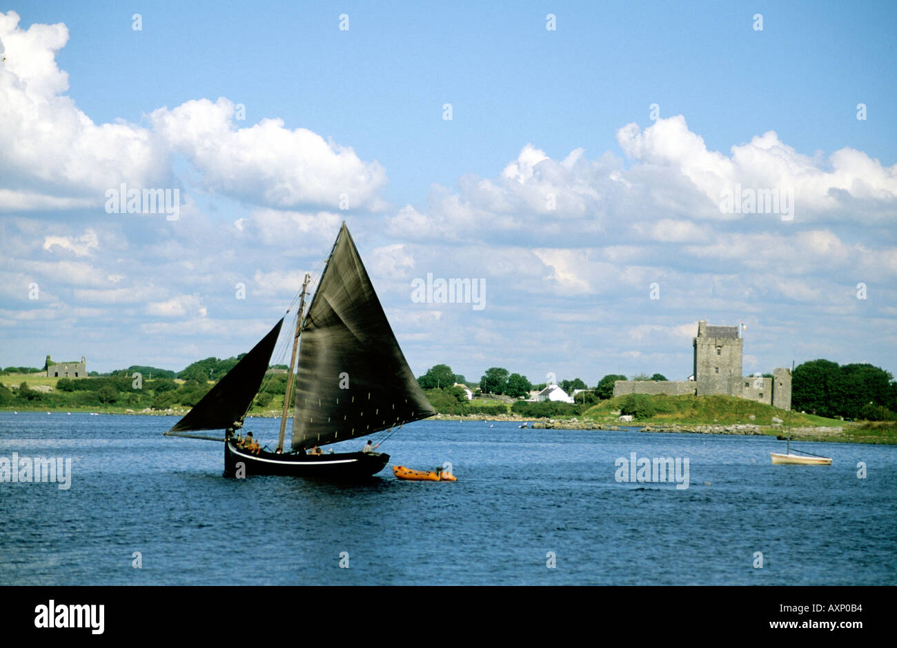 A Galway Hooker - local folk boat type- - sets sail from Kinvara on Galway Bay-Ireland Stock Photo