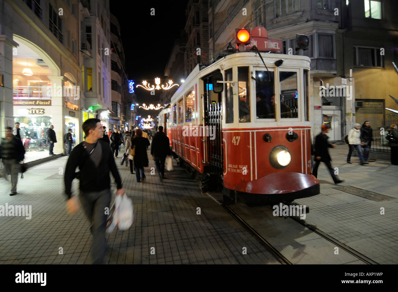 The 'nostalgy' tram running between Taksim Square and Tunel on Istiklal Cadesi, in Istanbul, Turkey Stock Photo