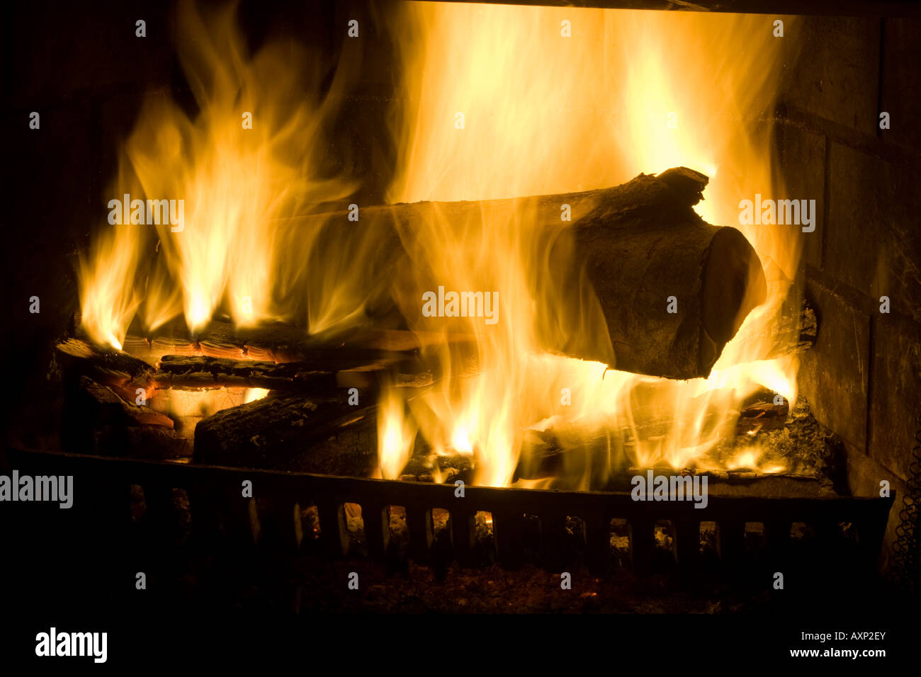 Burning wood in fireplace Stock Photo Alamy