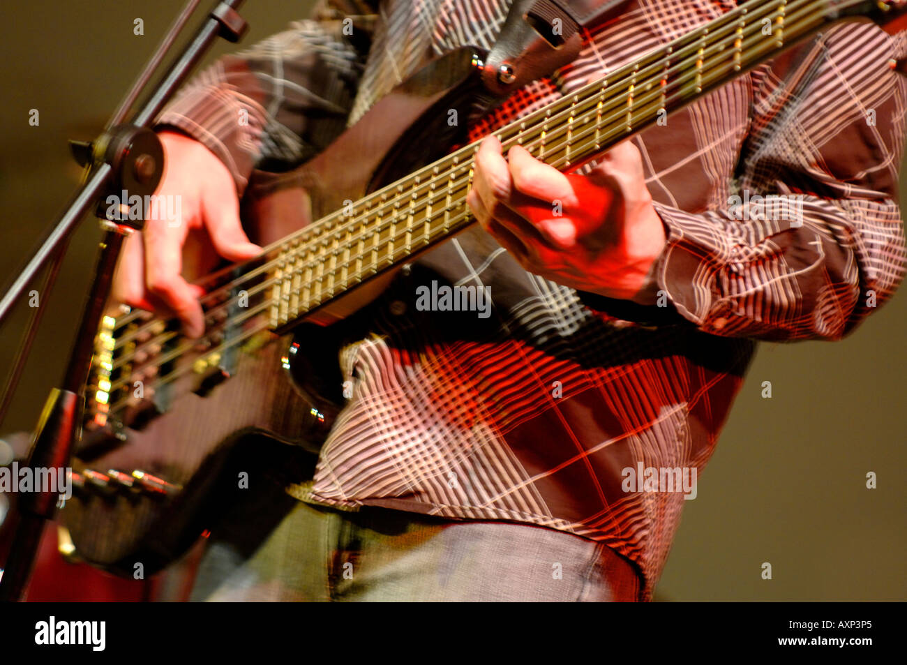 Bass guitar player Stock Photo - Alamy
