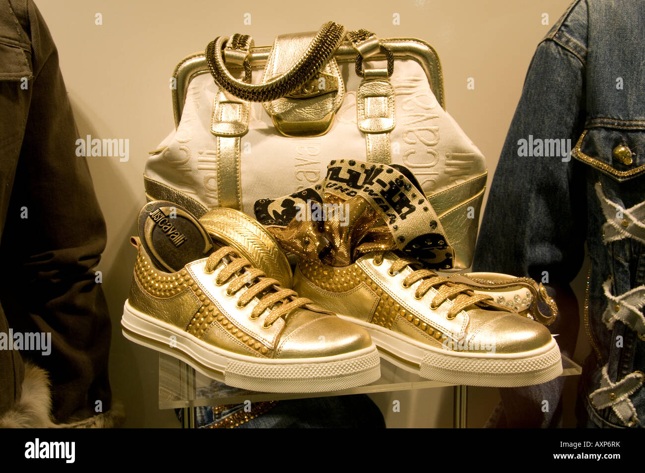 Golden Shoes Gym Sneakers Stock Photo