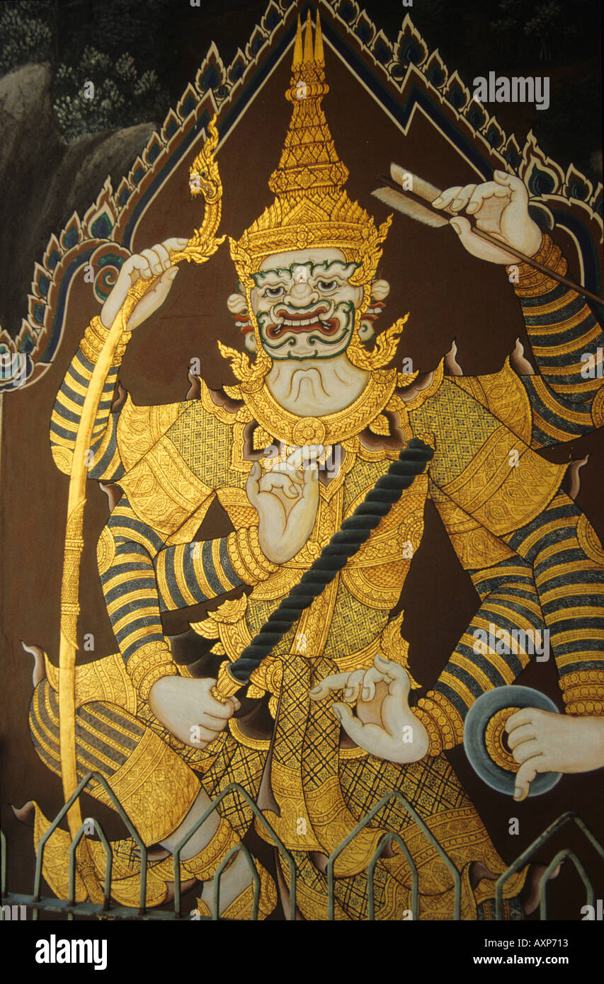 Hanuman in gold leaf on black lacquer panels in Bangkok temple Stock Photo