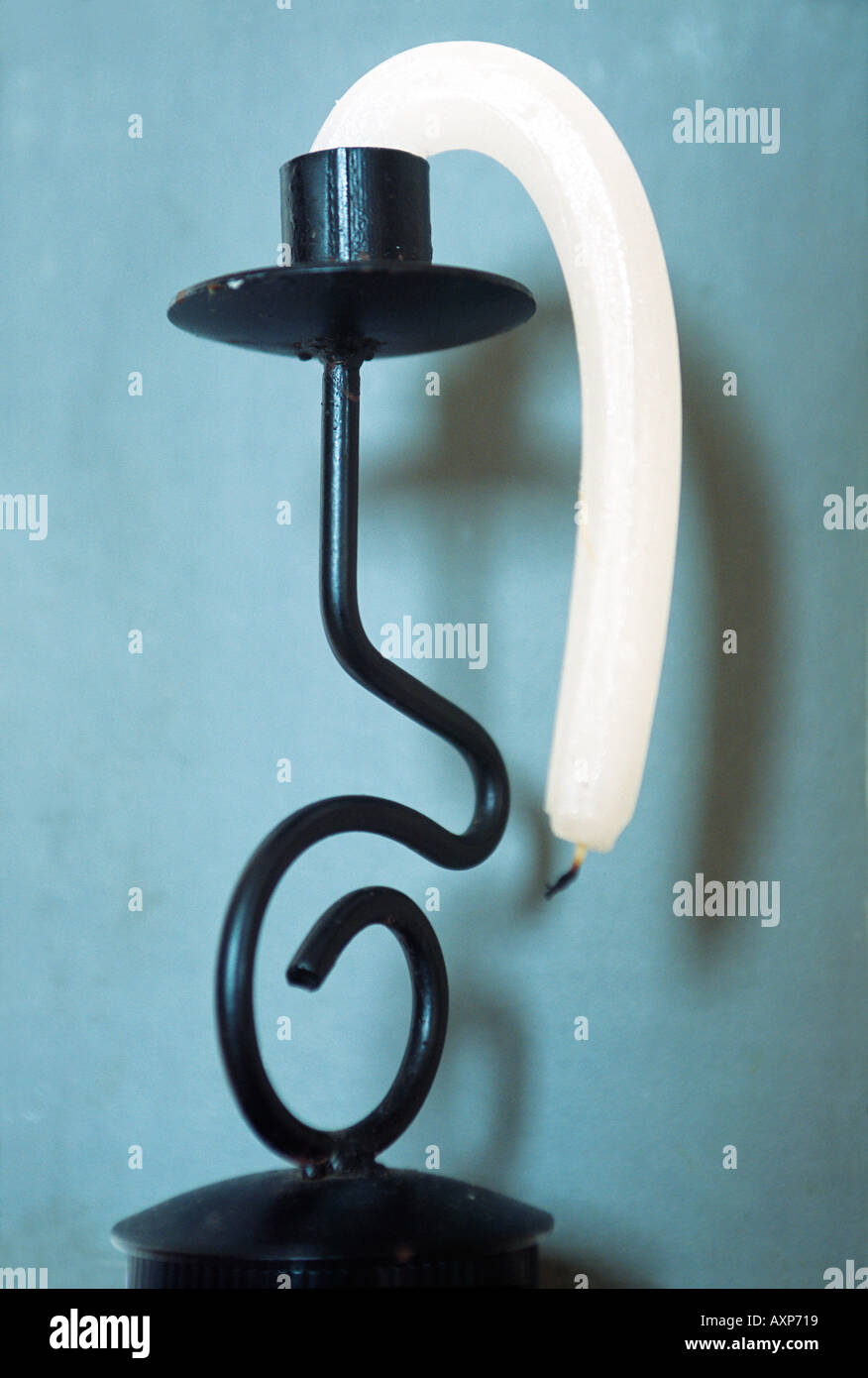 burnt-out-exhausted-and-bent-crooked-candle-AXP719.jpg