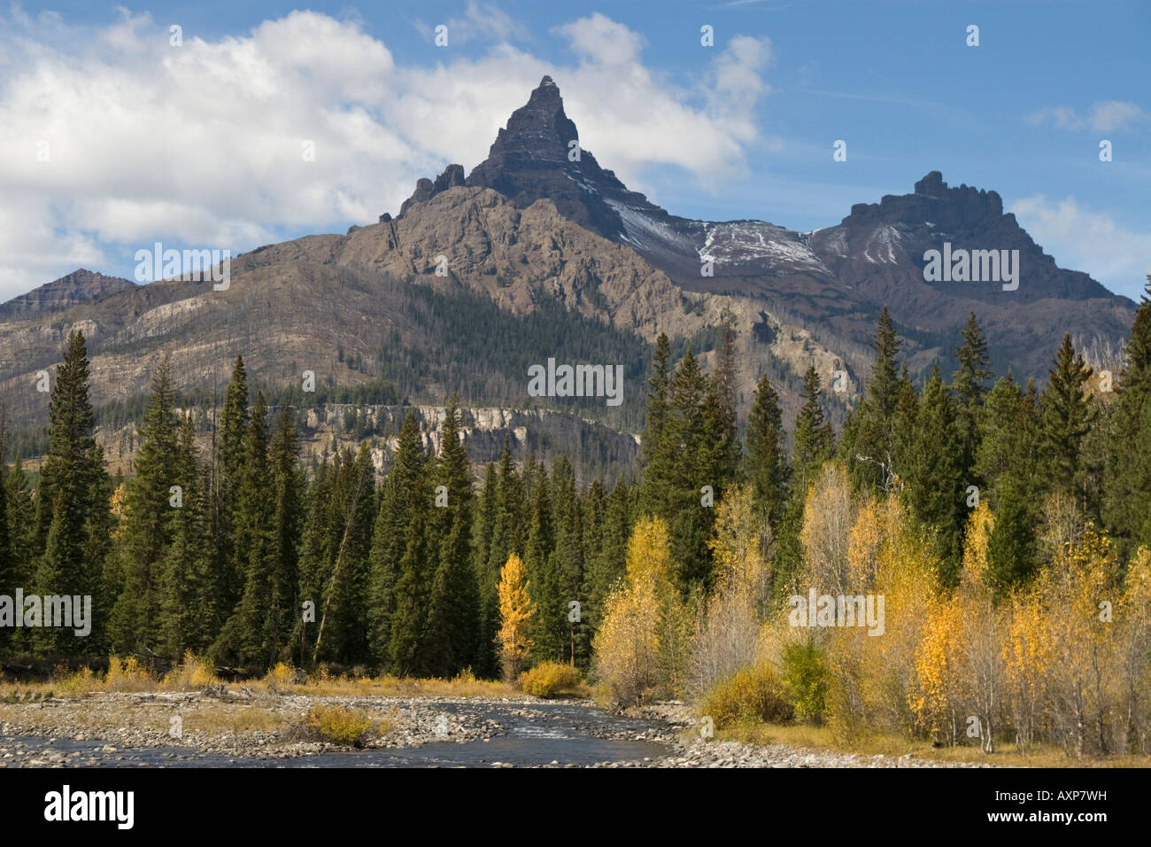 Pilot and Index Peaks tower above the 'Clarks Fork' River Montana Stock Photo