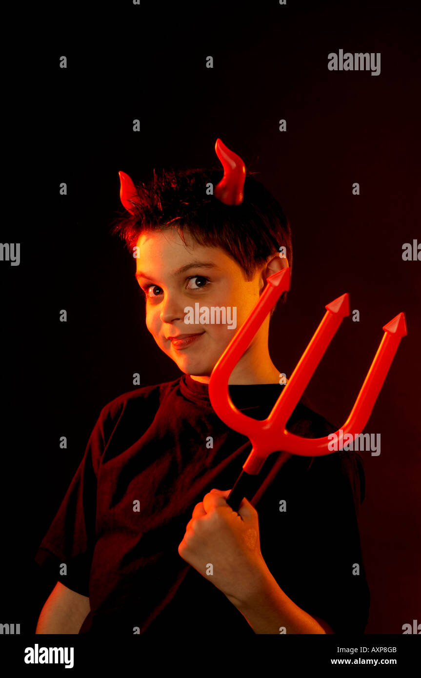Devil, horns, tripod, sneaky, expression, mischief, mischievous, trouble, behaviour, behavioural, problems, cute, Halloween, red Stock Photo