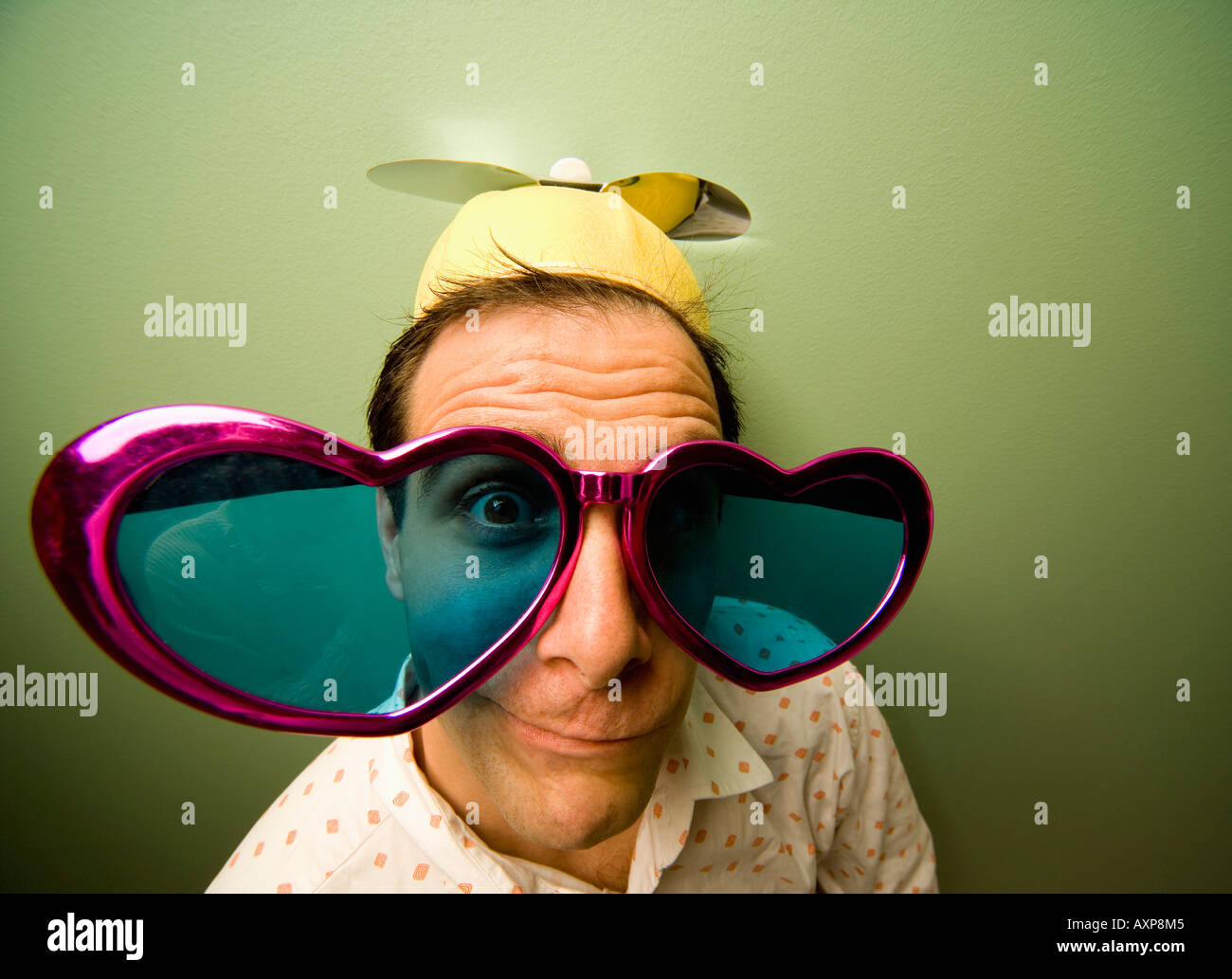 Man wearing funny hat and sunglasses Stock Photo - Alamy