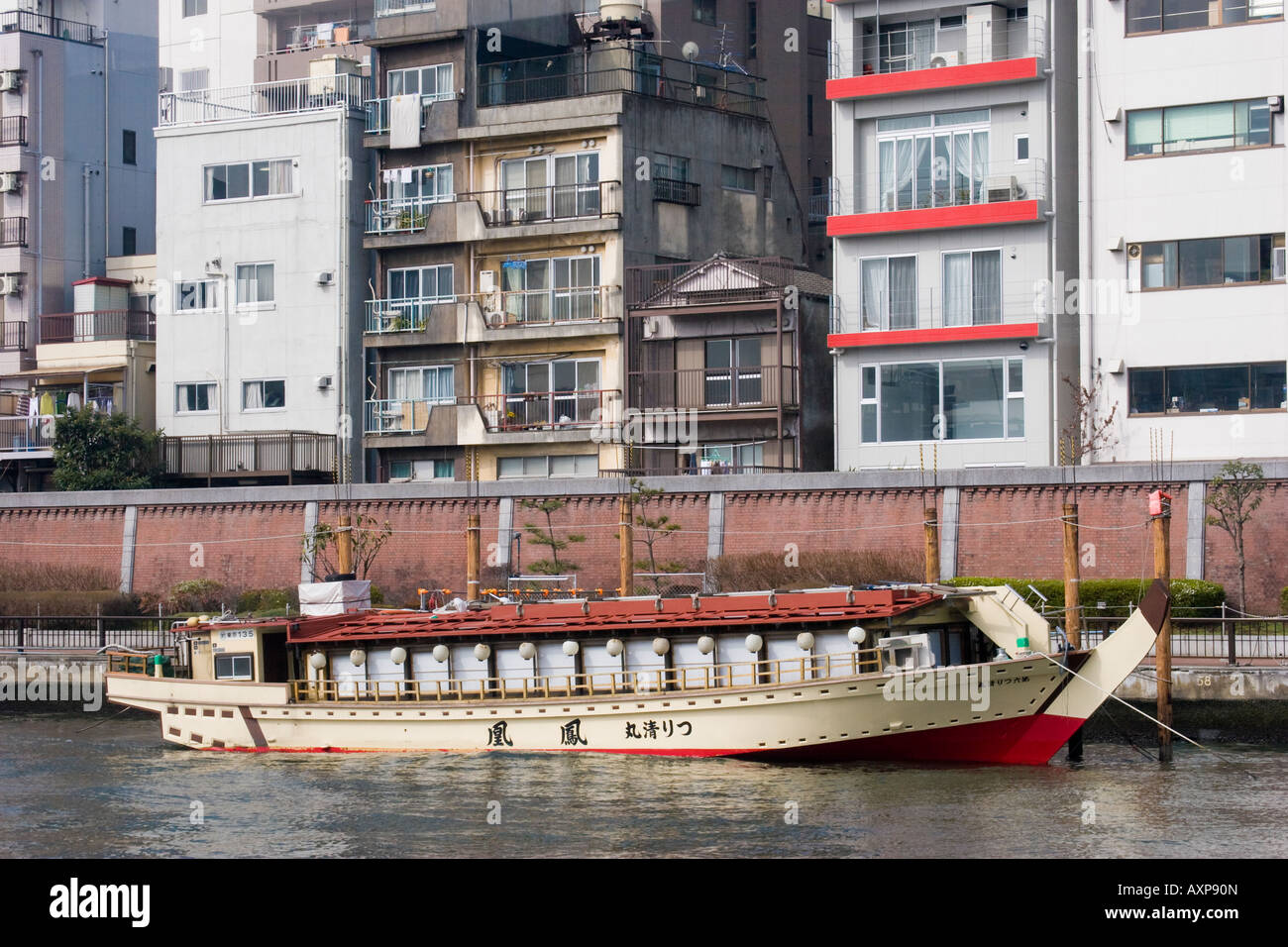 Restaurant boat docked on the Sumida River in Asakusa district of Tokyo Japan Stock Photo