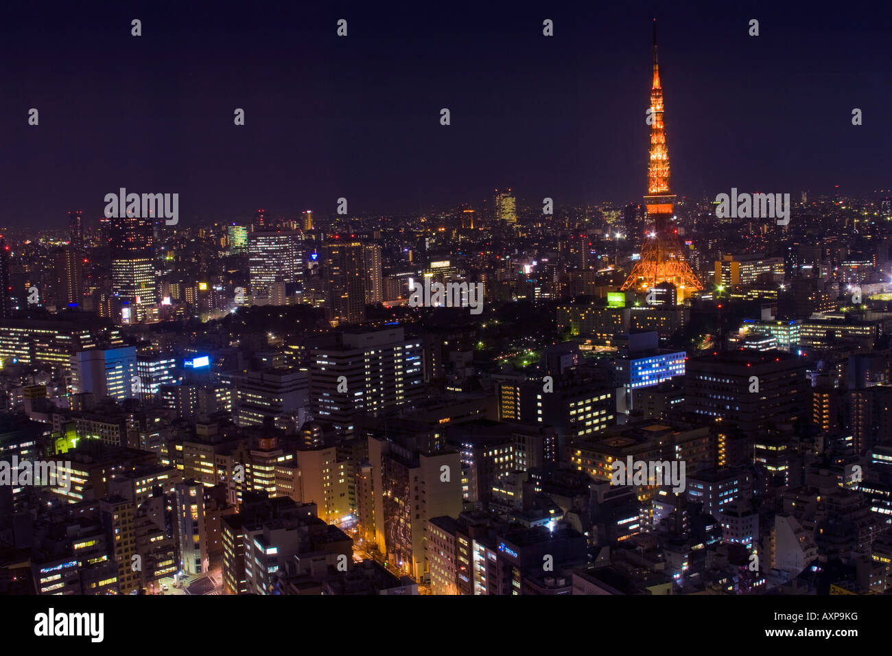 Aerial view of Tokyo Tower and the buildings of the Roppongi district of the city of Tokyo at night Stock Photo
