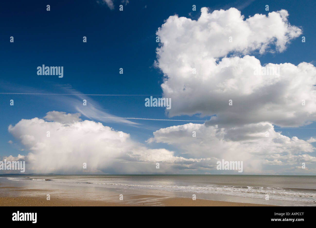 Cumulus Congestus clouds forming over the sea Bournemouth Dorset England UK Stock Photo