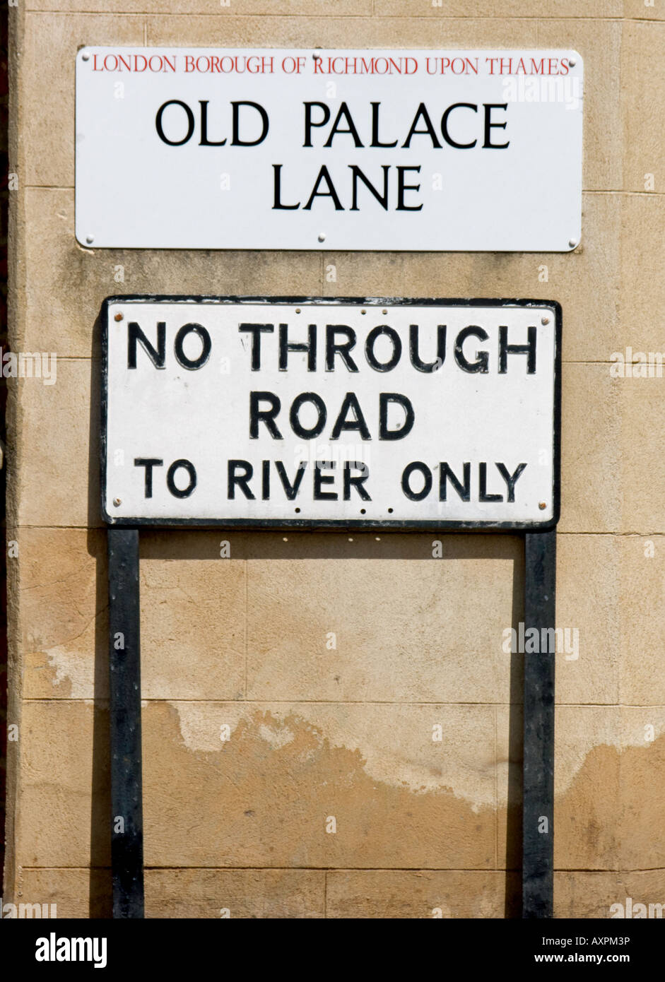 street sign for old palace lane and separate sign warning of road leading to river only, located in richmond, surrey, england Stock Photo