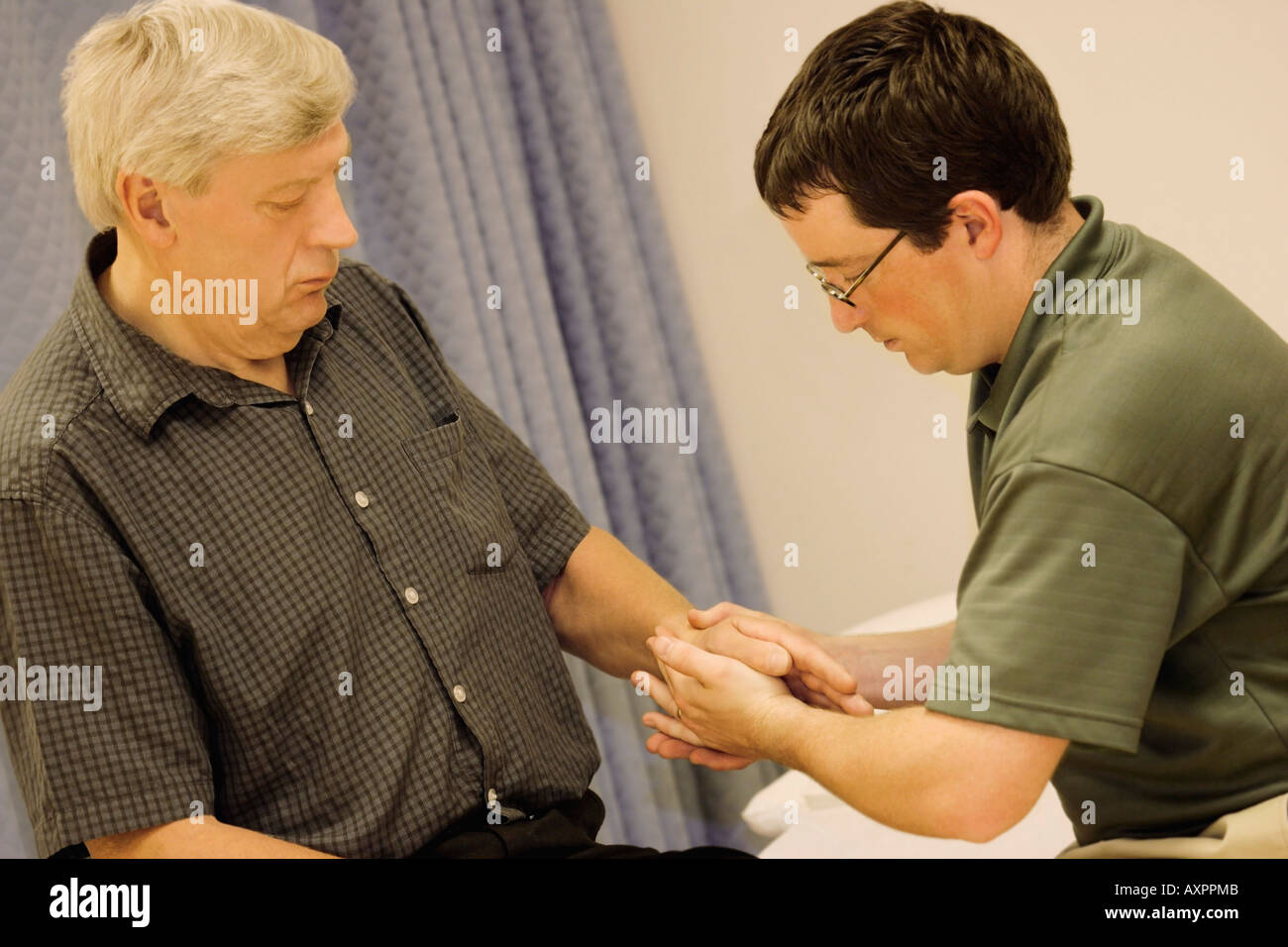 Assessing a patient Stock Photo - Alamy