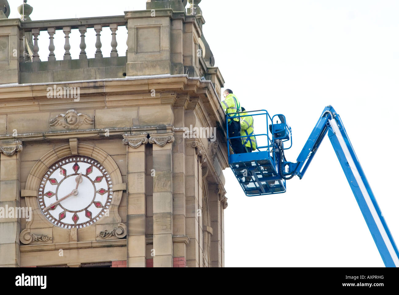 Cleaning the town hall clock tower Stock Photo Alamy
